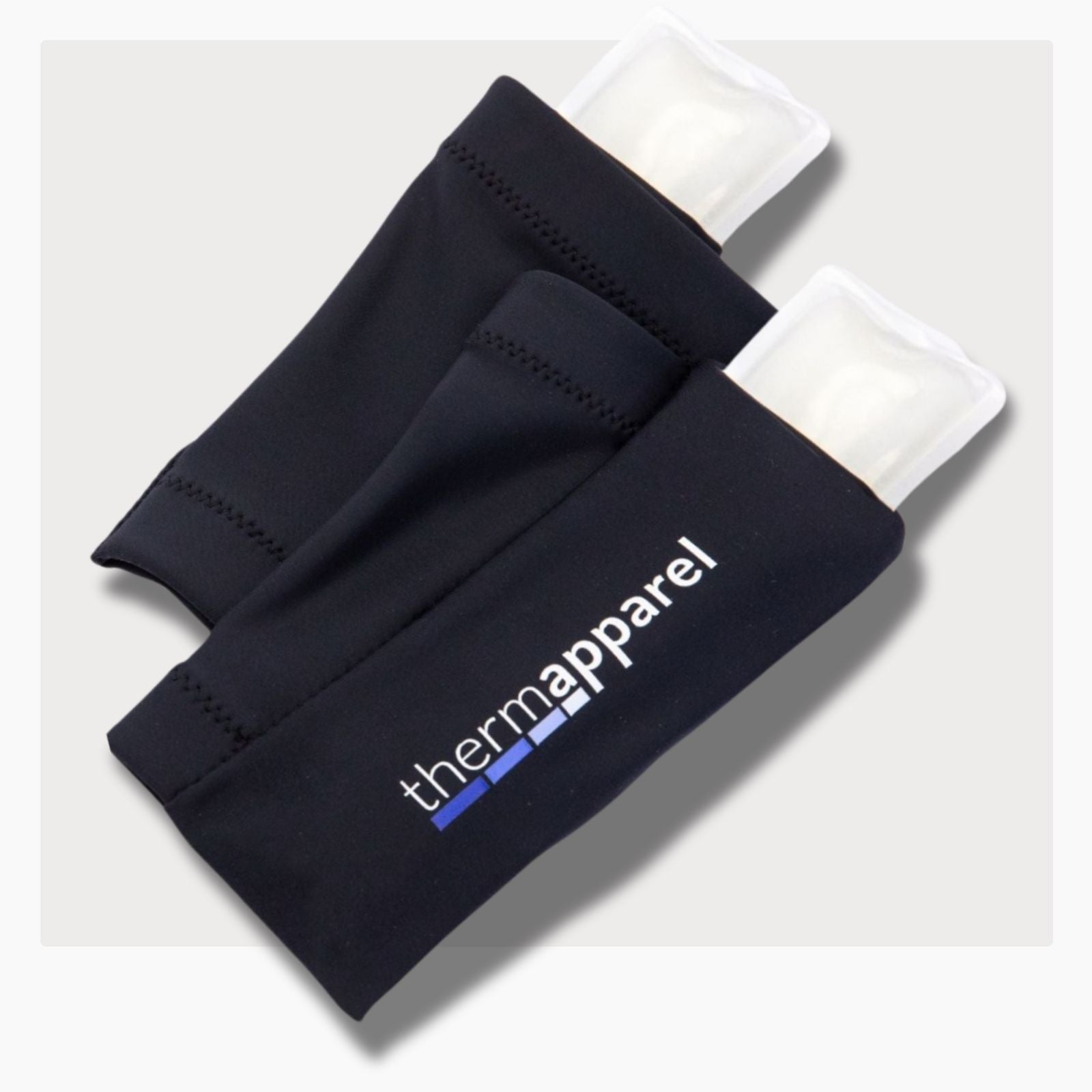 Black thermapparel CoolSleeve's with cooling packs on a white background