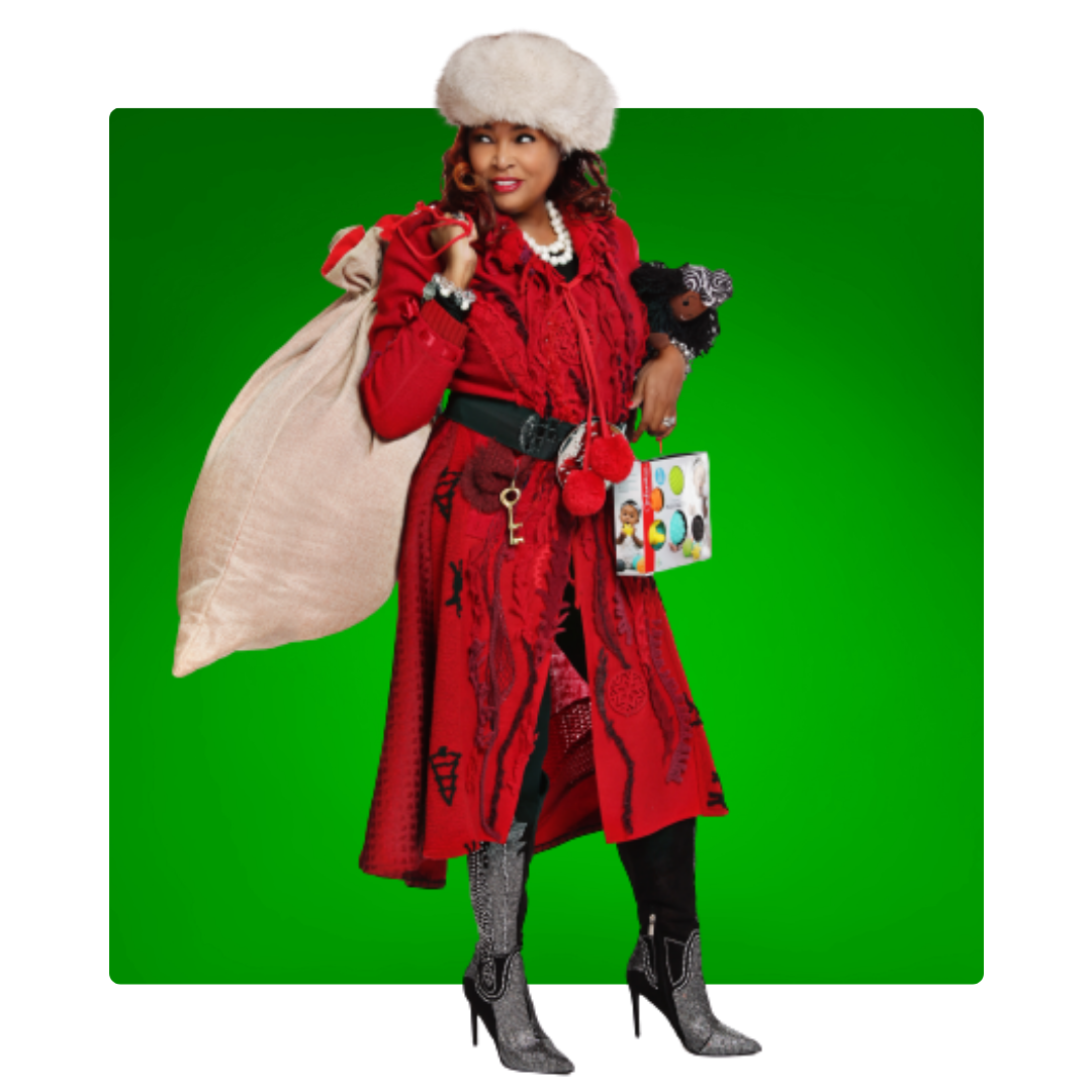 Ms. Santa Nashville in a red costume with a white hat, holding a bag and a gift box on a green background