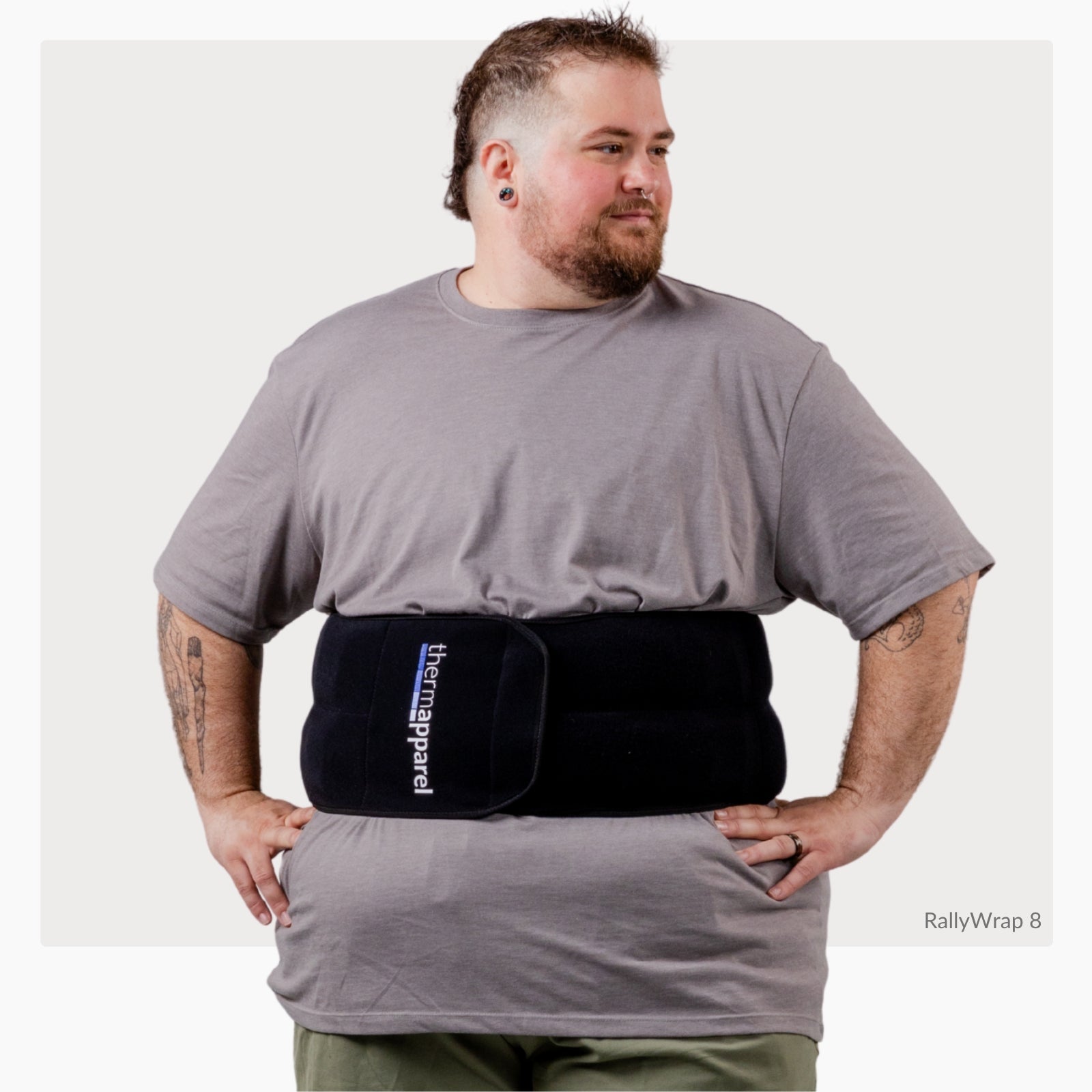 Man wearing a ThermApparel RallyWrap showing how the sizing fits on a white background
