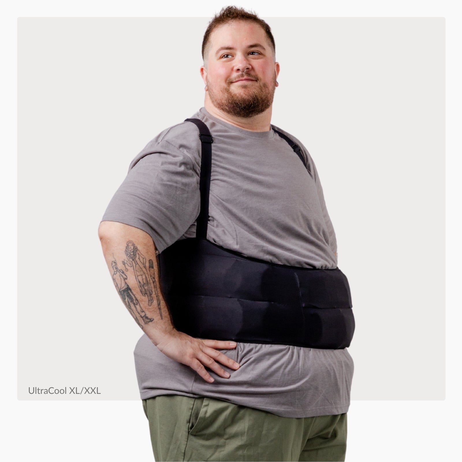 Man wearing a black ThermApparel UltraCool XL/XXL cooling vest on a white background